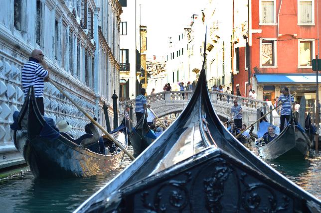 Venetian canal full of gondolas